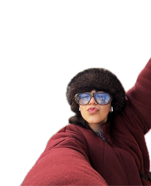 Woman in a fur hat and sunglasses